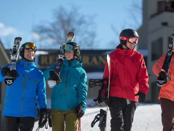 ski and stay, mountain club on loon, skiiers, snowboarding, summit, black diamond pub, slope side hotel, new england